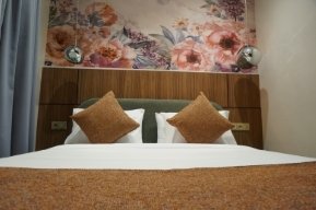 Chambre double élégante à l'Hotel Blue Pearl